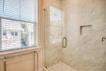Very spacious Master bathroom with window and large walk in shower